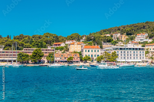 The old harbour at Hvar island, at the coast of Croatia, on a sunny day, summer time. © Zimu