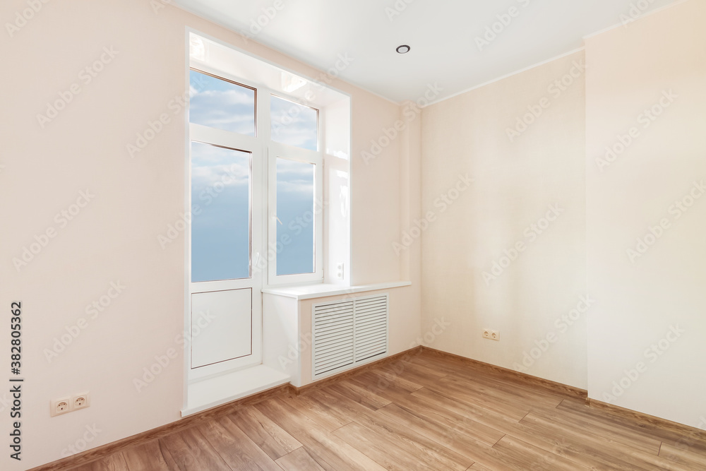 White empty room with big window and wooden floor. Loft interior mock up. 3d render home blank space. White empty room with big window and wooden floor. Loft interior mock up. 3d render home blank space.