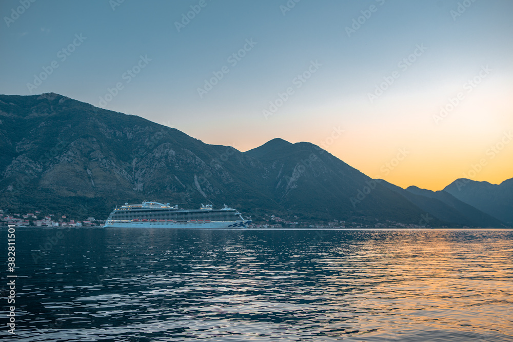 Sunset view of Kotor Bay in Montenegro,  with mountains and sea.