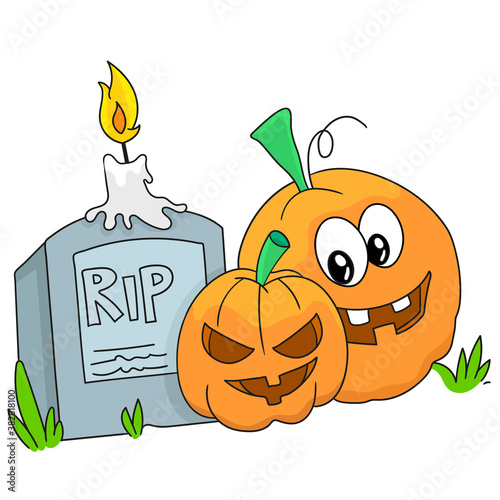 halloween pumpkin on tombstone graveyard