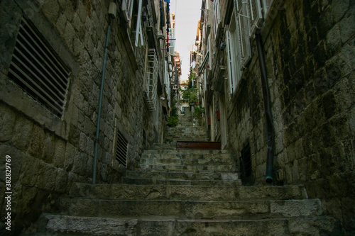 Dark Narrow Stairs Alley in the Old Town of Dubrovnik, Croatia © Yz-Wu