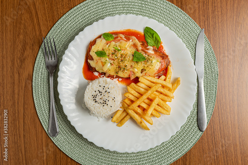 Parmegiana, Filet Parmegiana, with rice and chips