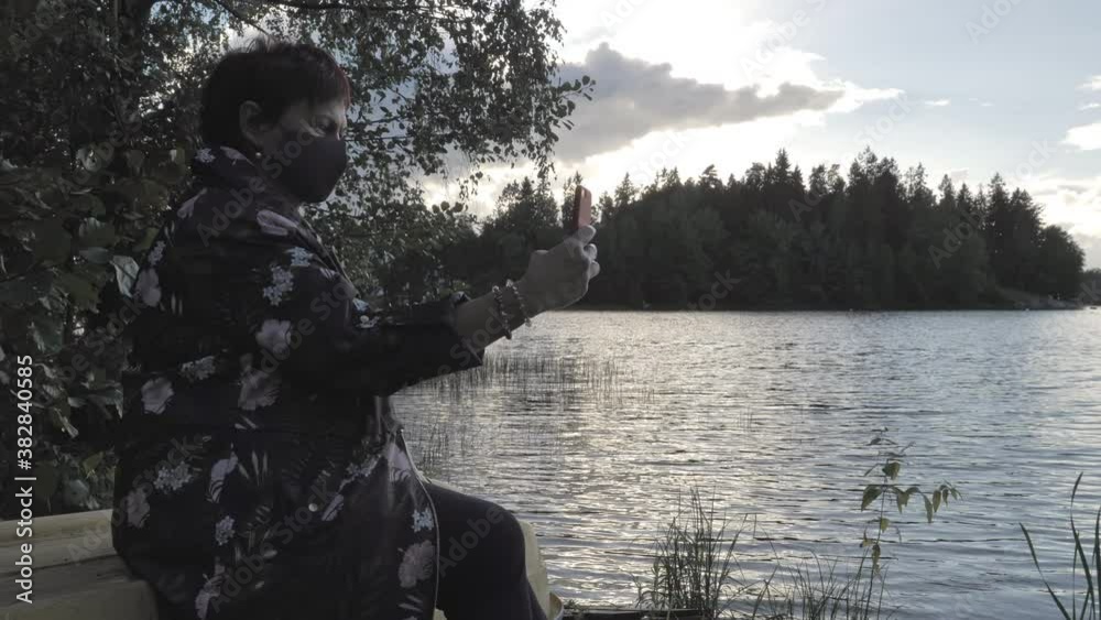 The lady taking photos of herself in Espoo Finland