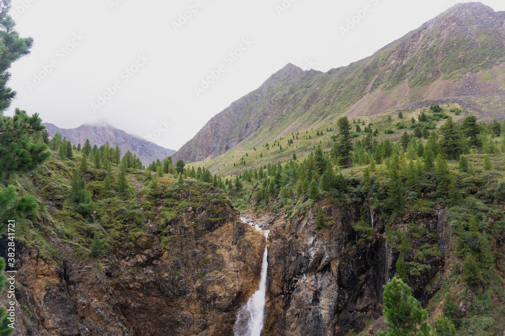 waterfall in the mountains waterfall in the mountains