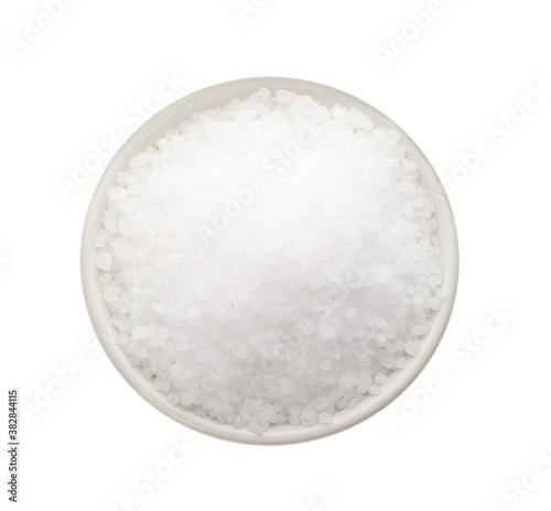 Bowl with natural salt isolated on white, top view