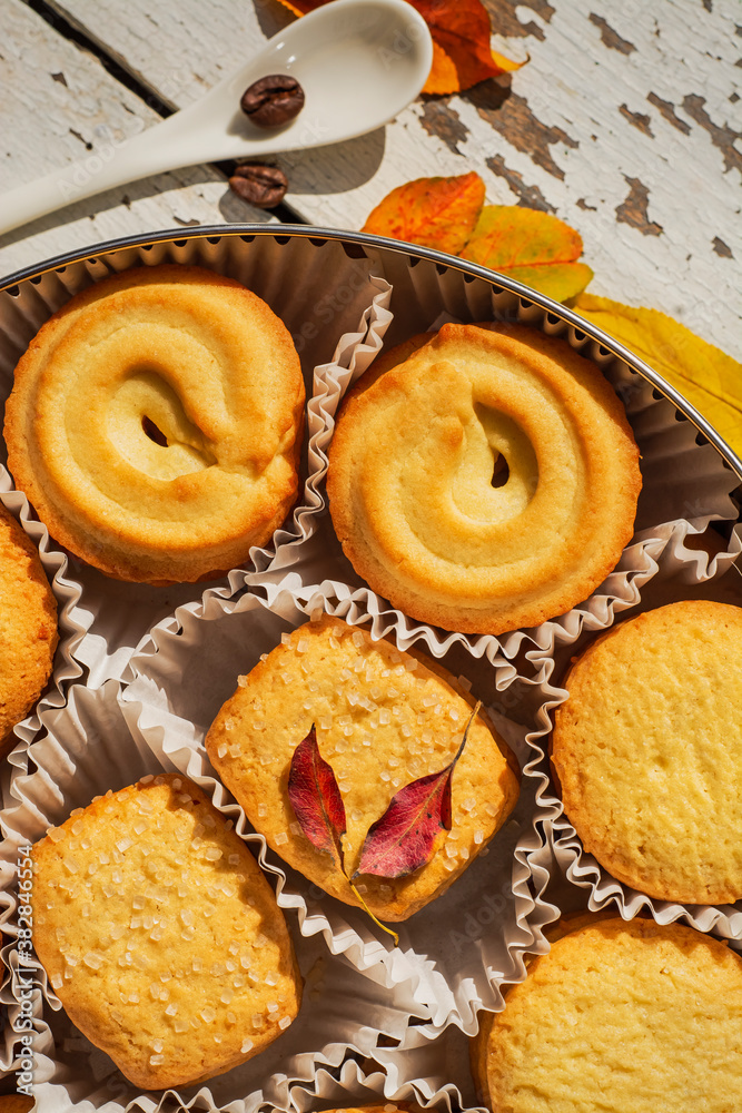 Cookies, blancket and autumn leaves. Background, biscuit. Cookies, blancket and autumn leaves. Background, biscuit.