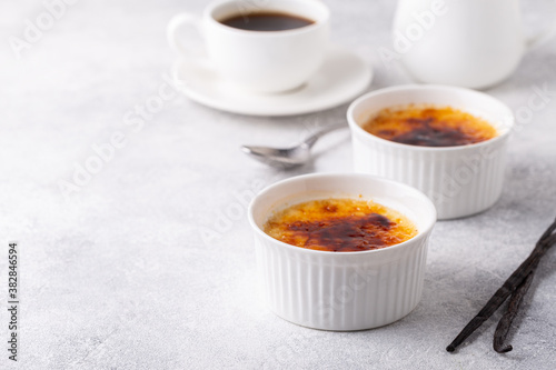 Creme brulee. French vanilla cream dessert with caramelised sugar. photo