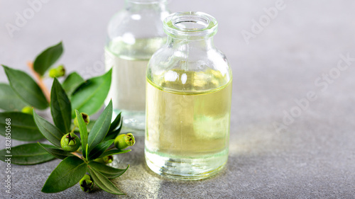 Bottles of essential oils for aromatherapy treatment.