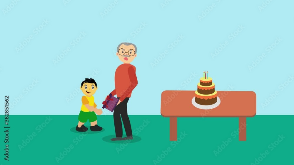 Little boy giving a gift box to his grandfather Little boy giving a gift box to his grandfather