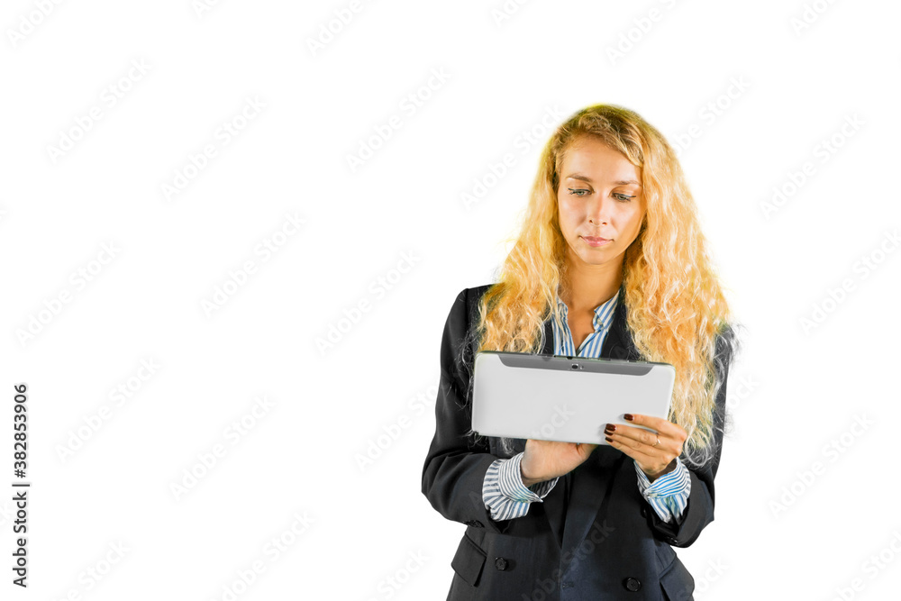 Blonde businesswoman using a tablet on studio Blonde businesswoman using a tablet on studio