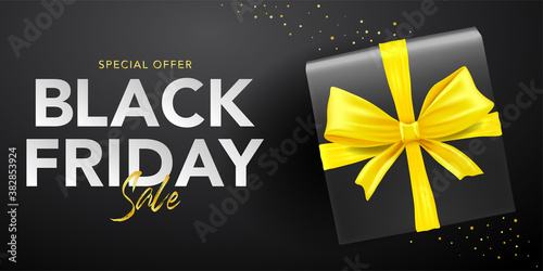 vector banner template of box with black ribbons and black friday sale tags in black background. black friday concept