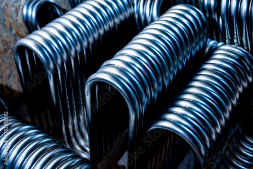 Abstract industrial background of metal pipes construction.