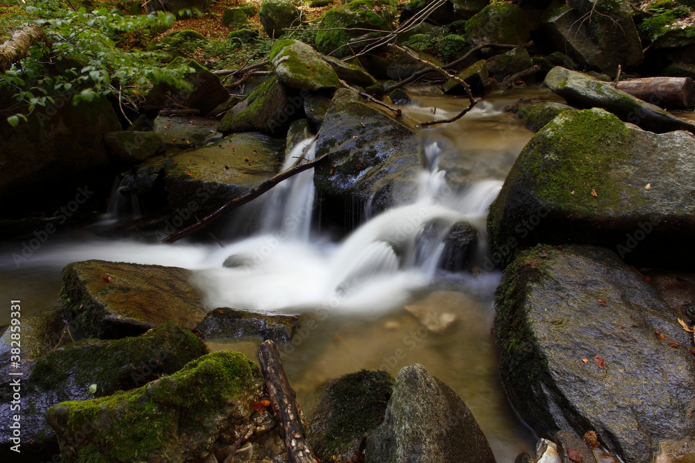 Mountain stream in autumn. Stream in the forest. Mountain stream in autumn. Stream in the forest.
