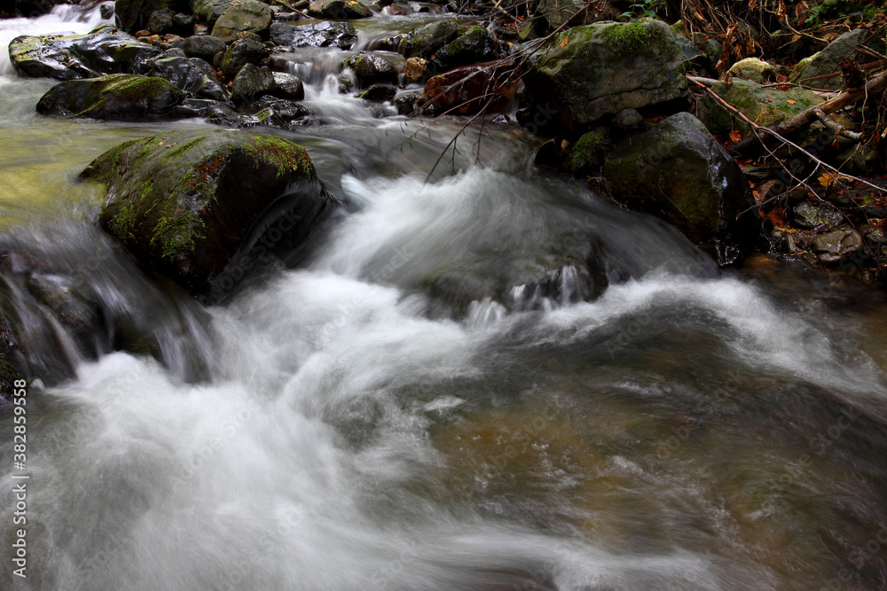 Mountain stream in autumn. Stream in the forest. Mountain stream in autumn. Stream in the forest.