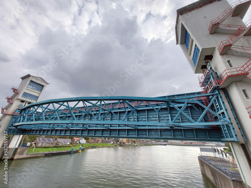 Steel bridge and double water barrier in the river Hollandsche IJssel photo