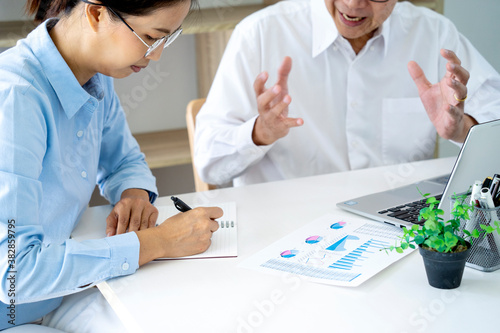 businessman and woman talking discussing about the job business plan