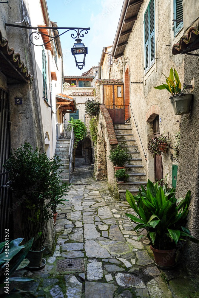 narrow street in the town of Zuccarello, Savona, Italy