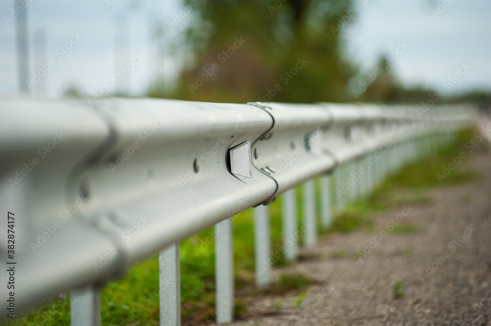 Smooth asphalt road with bumpers and markings Stock Photo | Adobe Stock