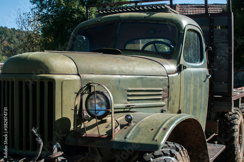 Old rusty soviet vintage heavy big truck closeup