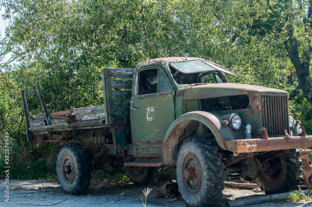 Old rusty soviet vintage heavy big truck closeup