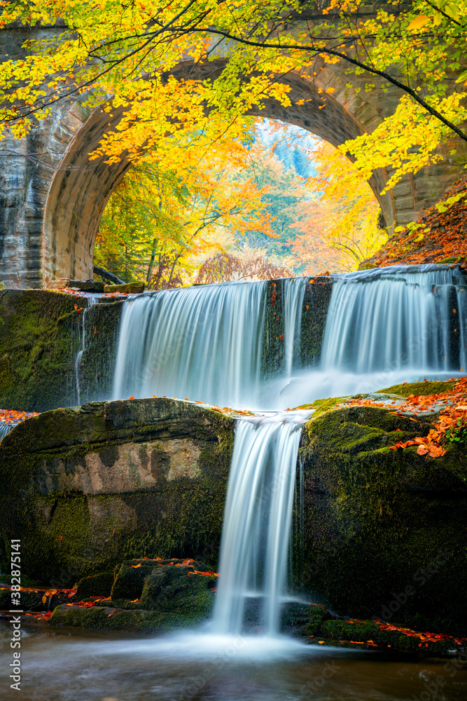 Obraz premium Fall Autumn landscape - river waterfall in colorful autumn forest