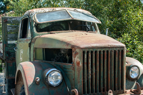 Old rusty soviet vintage heavy big truck closeup