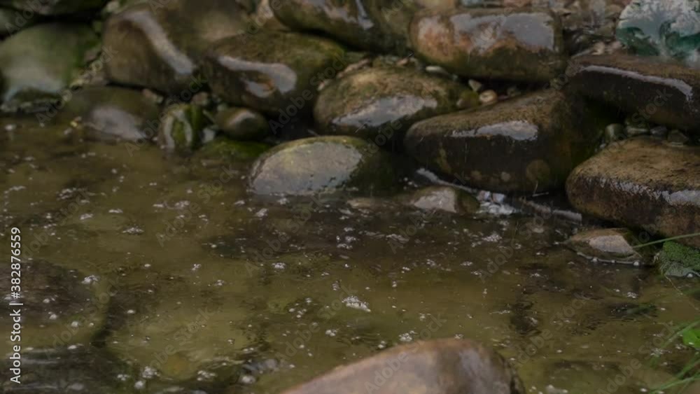 artificial waterfall on natural stones in your own garden artificial waterfall on natural stones in your own garden