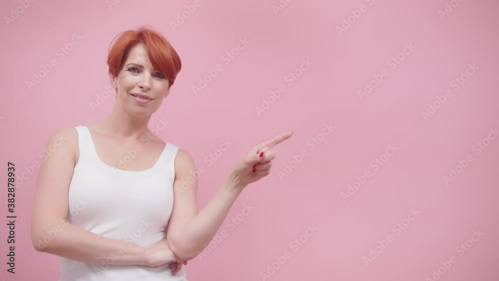 Woman thinking and having an idea on isolated pink background Woman thinking and having an idea on isolated pink background