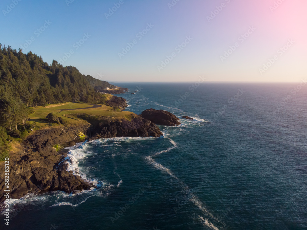 Amazing aerial drone view of rocky coast in ocean wave. Fantastic landscape at sunny weather. Wallpaper design. Amazing aerial drone view of rocky coast in ocean wave. Fantastic landscape at sunny weather. Wallpaper design.
