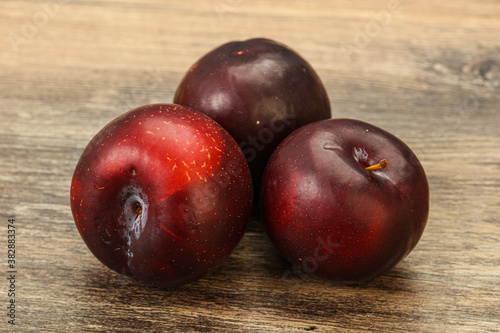 Ripe sweet plum fruit heap