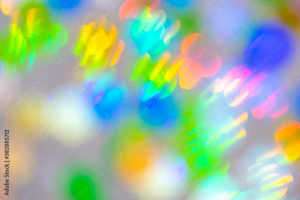 Christmas and new year concept - Defocused, blurred abstract multicolored bokeh lights background. Christmas and new year concept - Defocused, blurred abstract multicolored bokeh lights background.
