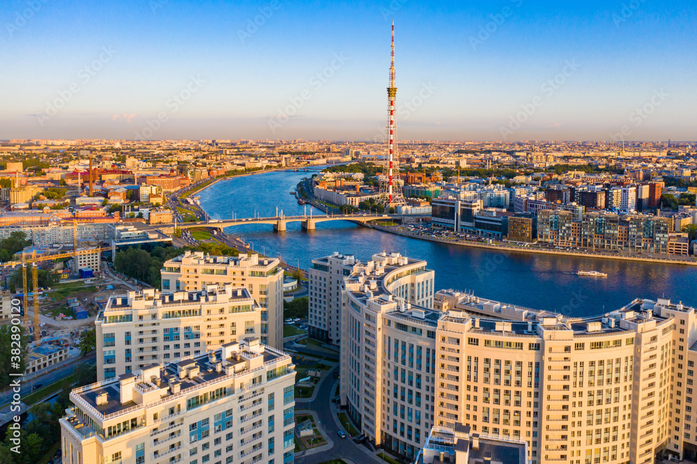 Saint Petersburg. Russia. View of the city from the drone. the Neva river in the afternoon. Rivers Of St. Petersburg. New quarters of St. Petersburg. Modern urban architecture. Urban infrastructure