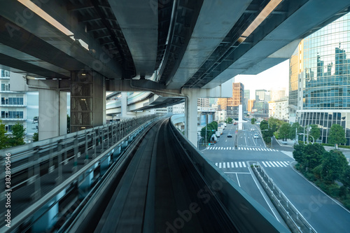 Japan. Tokyo. Transport system of the Japanese city. Roads are located on several levels. Bridge for train traffic in the capital of Japan. Urban public transport. Travel to Japan.