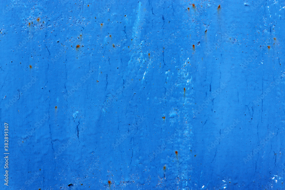 Old cracked blue wall background. Rusty metal with blue paint Old cracked blue wall background. Rusty metal with blue paint