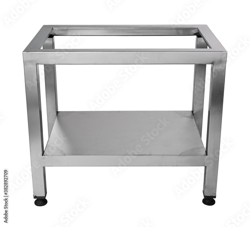 Metal industrial kitchen table for food preparation isolated on white