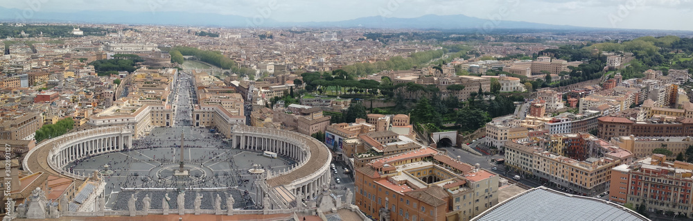 Ultra wide aerial view of Rome and Vaticano City from the dome of Basilica di St. Pietro