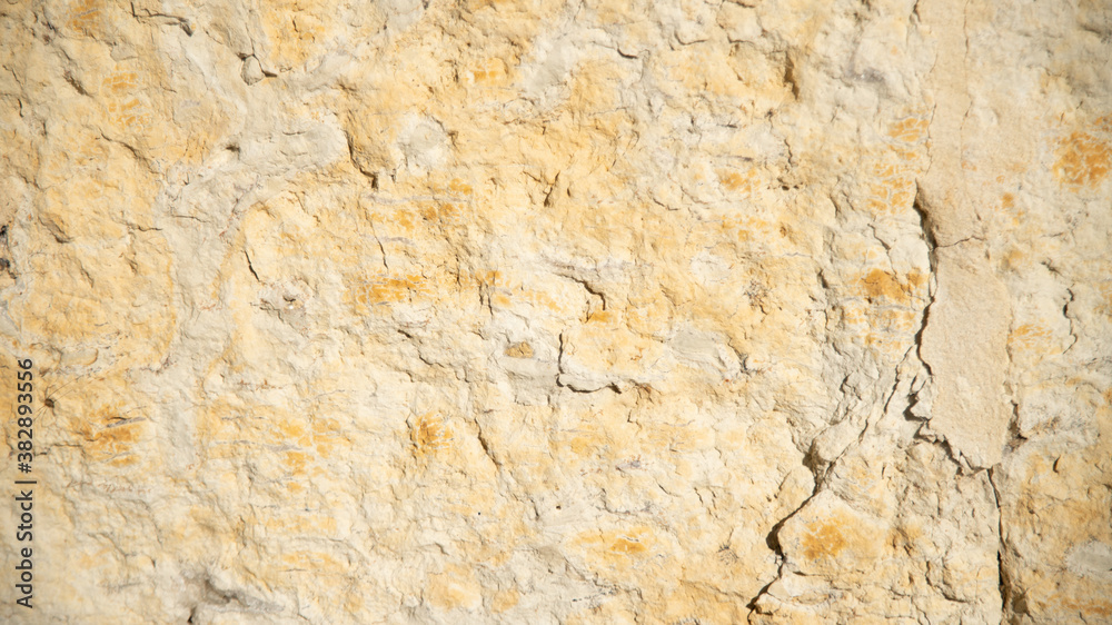
Close up on a warm colored stone wall
