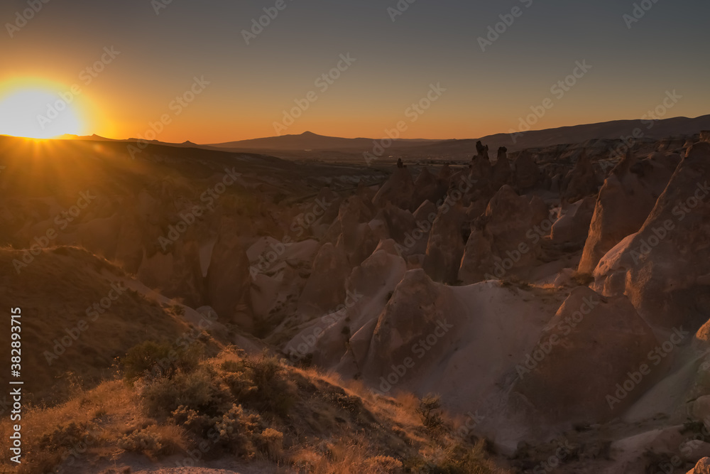 Rock Formations landscape of Goreme National Park at sunset, Cappadocia, Turkey.