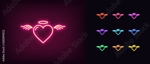 Neon angel heart, glowing icon. Neon saint heart with wings and nimbus. Flying angelic love