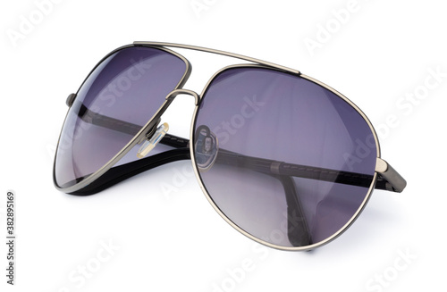 Stylish sunglasses isolated on white background, close up
