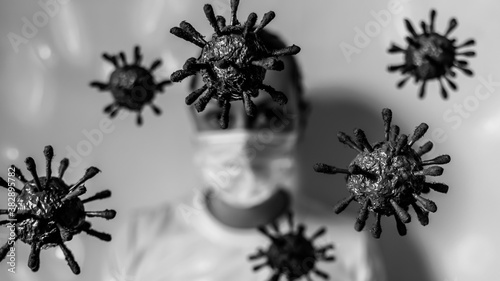 
Representation of the coronavirus, covid 19, and masked woman