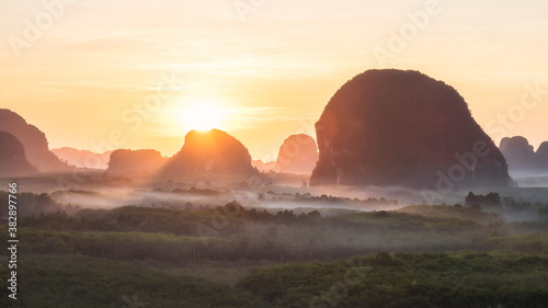 sunrise with mountains and mist  Krabi forest