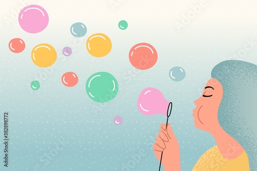 Girl blowing soap bubbles. Flat vector illustration