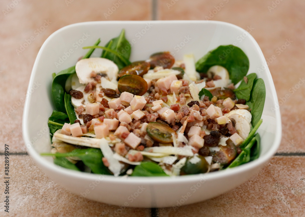 Top view of spinach, mushroom and ham salad Top view of spinach, mushroom and ham salad