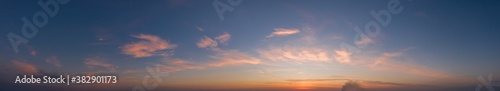 Colorful sky with cirrus clouds during dawn. High resolution panorama. View from above
