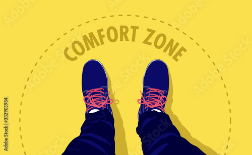 Standing in comfort zone - Looking down on feets and shoes inside a border of comfort, about step out and leave. Vector illustration. photo
