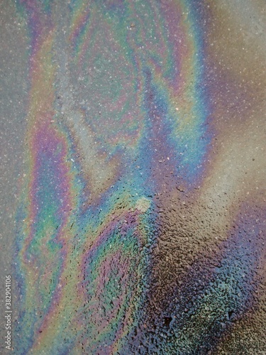Abstract background with rainbow colors. Stain of gasoline.