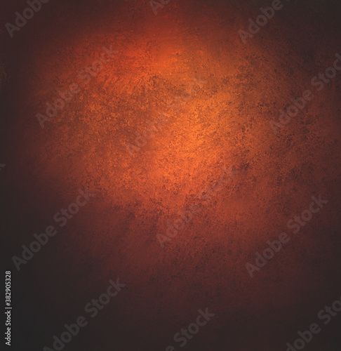 abstract orange background, old black vignette border or frame, vintage grunge background texture design for halloween or autumn backgrounds