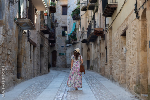Mujer caminando por las calles de Valderrobres en Aragón, España. El matarraña photo