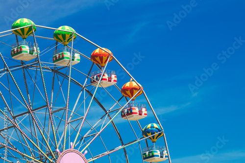 Ferris Wheel with Blue Sky and clouds